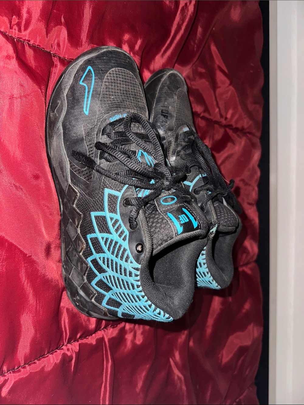 Puma Black Sneakers with Teal Geometric Stitching